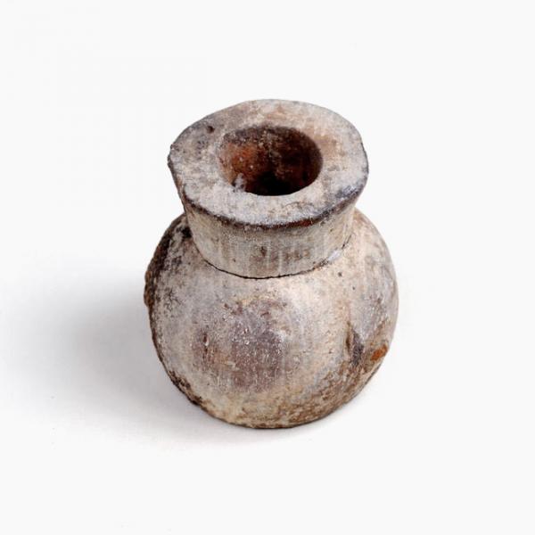 Mortero pequeño de madera (vista superior)