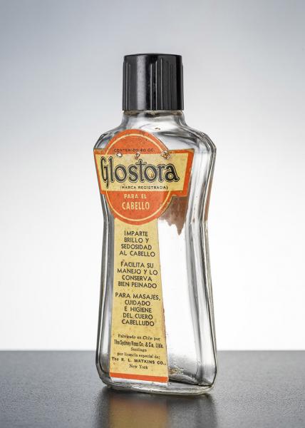 Botella de brillantina y fijador capilar Glostora Botella de brillantina y fijador capilar Glostora