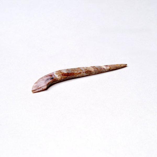 Anzuelo de concha pulida